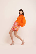 Load image into Gallery viewer, ORANGE ORGANZA KNOT COLLARED TOP WITH PRINTED SHORTS