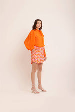 Load image into Gallery viewer, ORANGE ORGANZA KNOT COLLARED TOP WITH PRINTED SHORTS