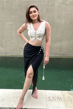 Load image into Gallery viewer, SHEFALI JARIWALA IN OUR WRAPOVER SKIRT AND DHOOP CHAON WAIST COAT
