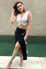 Load image into Gallery viewer, SHEFALI JARIWALA IN OUR WRAPOVER SKIRT AND DHOOP CHAON WAIST COAT
