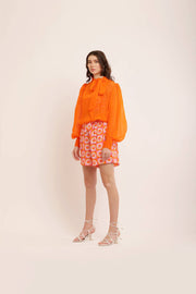 ORANGE ORGANZA KNOT COLLARED TOP WITH PRINTED SHORTS